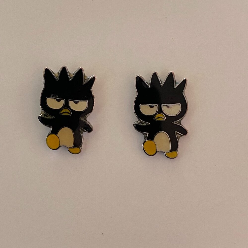 Pre-owned Hello Sanrio Badtz-Maru enamel stud earrings.